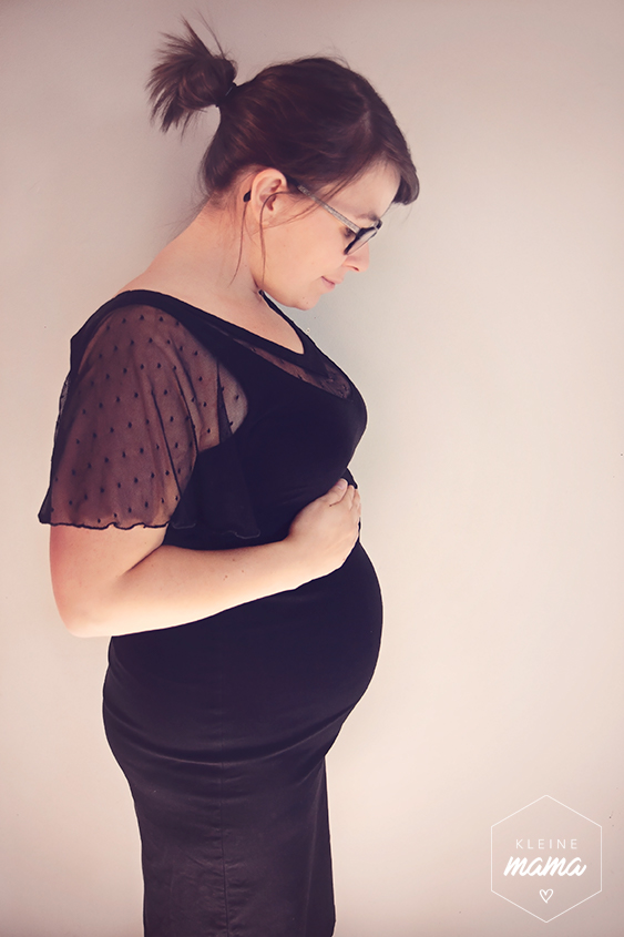 Foto van vrouw met zwangere buik van twintig weken